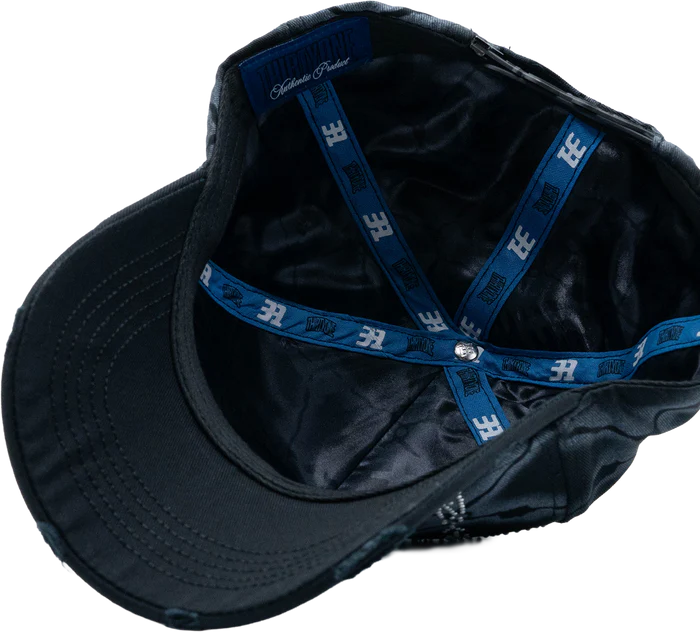 CAGED IN HAT