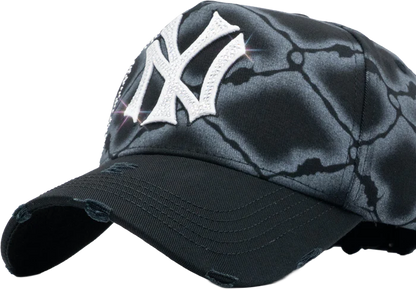CAGED IN HAT